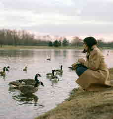 1976-01-01, 013, Linda Feeding Ducks in Saddle Brook Lake, NJ